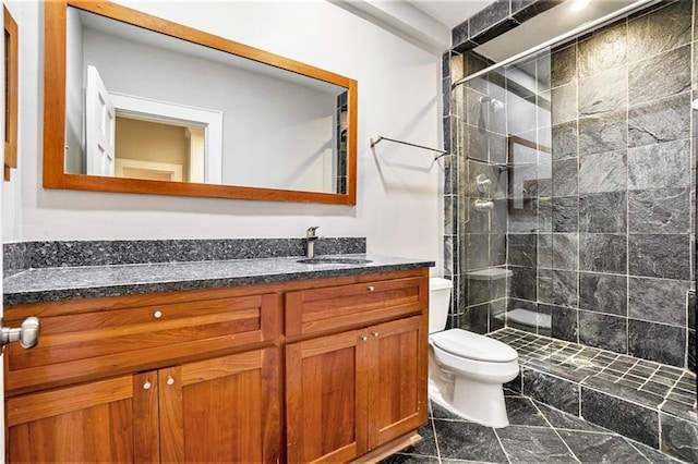 1156 Piedmont Ave NE Unit B3, Atlanta, GA 30309 - bathroom featuring vanity, toilet, and a shower stall