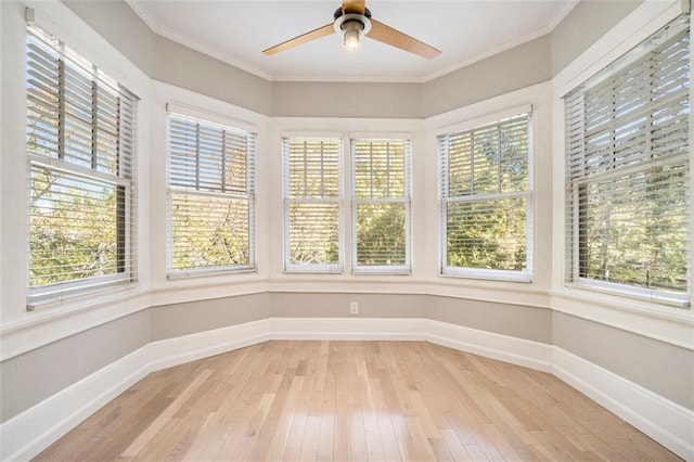 1156 Piedmont Ave NE Unit B3, Atlanta, GA 30309 - unfurnished sunroom featuring hardwood / wood-style floors, baseboards, and crown molding