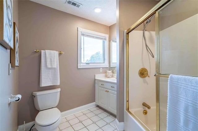 full bath with visible vents, vanity, shower / bath combination with glass door, toilet, and baseboards