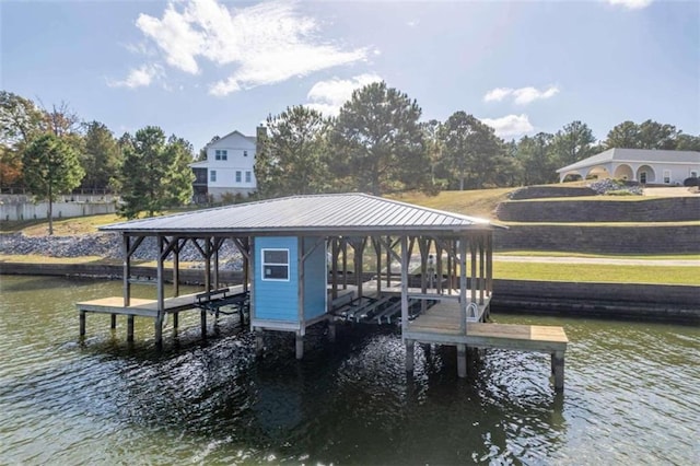 view of dock with a water view and boat lift