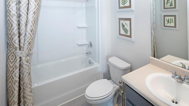 full bathroom featuring vanity, shower / tub combo, and toilet