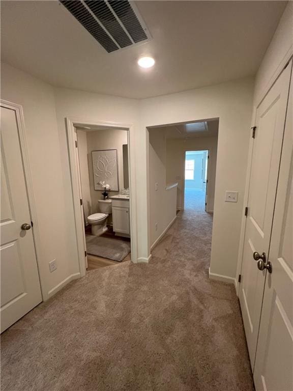 1567 Aiden Way Unit 34, Conyers, GA 30013 - hallway featuring baseboards and carpet floors