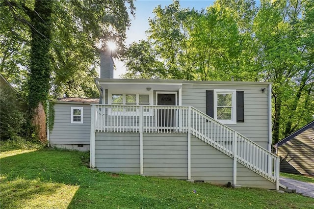 exterior space featuring a front lawn