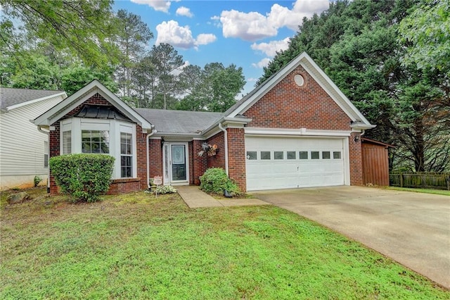 1965 Sterling Creek Ct, Snellville, GA 30078 - view of front of house featuring a garage, brick siding, driveway, and a front yard