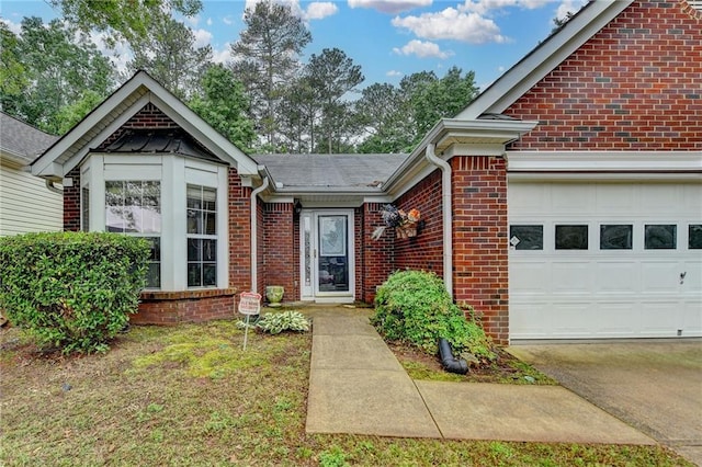 1965 Sterling Creek Ct, Snellville, GA 30078 - view of front facade featuring brick siding and a garage
