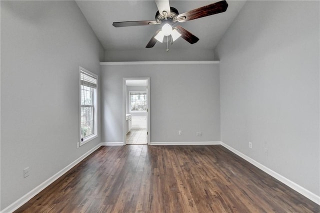 1965 Sterling Creek Ct, Snellville, GA 30078 - empty room featuring dark wood finished floors, baseboards, a ceiling fan, and lofted ceiling