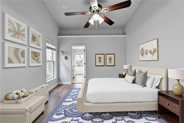 1965 Sterling Creek Ct, Snellville, GA 30078 - bedroom with wood finished floors, vaulted ceiling, ensuite bathroom, a ceiling fan, and baseboards