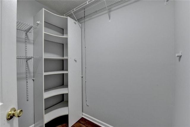 1965 Sterling Creek Ct, Snellville, GA 30078 - spacious closet with dark wood-style floors