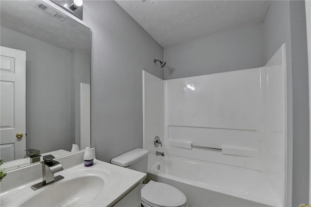 1965 Sterling Creek Ct, Snellville, GA 30078 - bathroom with a textured ceiling, toilet, bathing tub / shower combination, and vanity