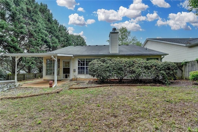 1965 Sterling Creek Ct, Snellville, GA 30078 - back of house featuring a patio area and a chimney