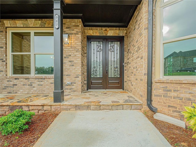 doorway to property featuring a porch