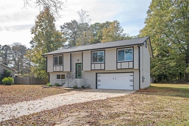 raised ranch featuring a garage