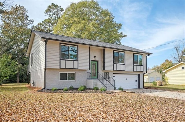 raised ranch featuring a garage