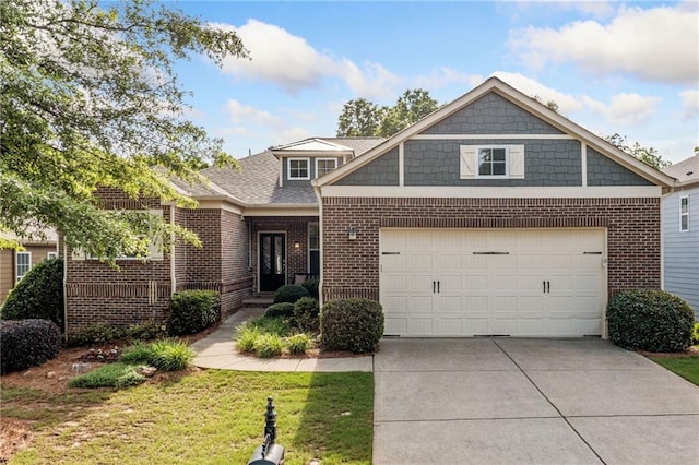 view of front facade featuring brick siding, driveway, and a front yard