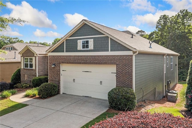 view of front facade with brick siding, driveway, and a garage