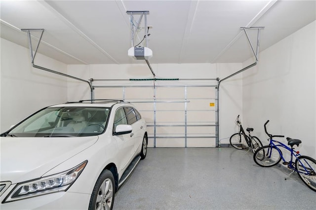 garage featuring a garage door opener