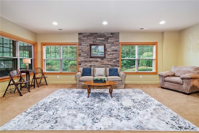 carpeted living room featuring recessed lighting and baseboards