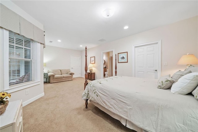 bedroom featuring light colored carpet, baseboards, and recessed lighting