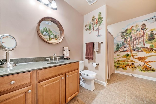 bathroom with toilet, vanity, tile patterned flooring, baseboards, and a shower with curtain