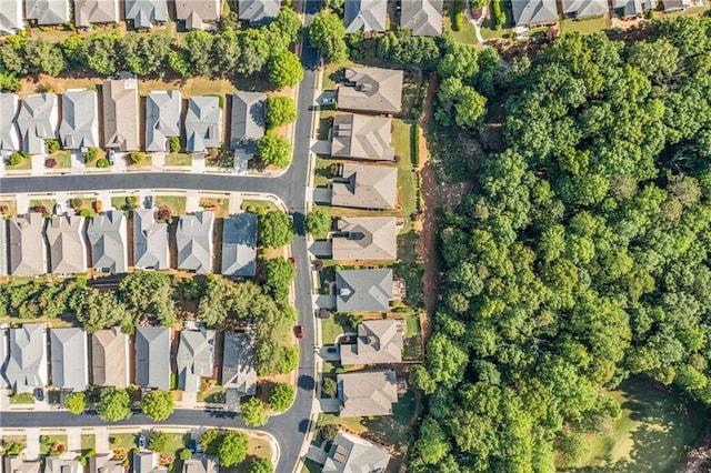 aerial view of property's location featuring nearby suburban area