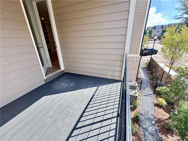 wooden deck featuring fence