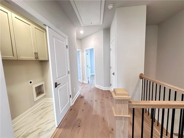 hall featuring baseboards, recessed lighting, an upstairs landing, attic access, and light wood-style floors