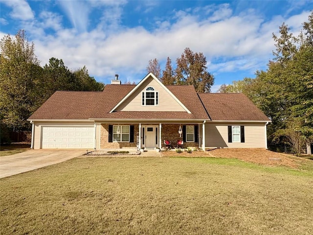 view of front of house with a garage and a front lawn