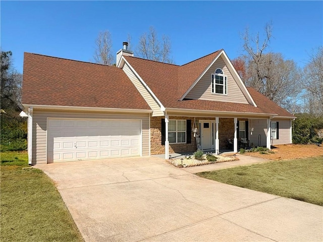 view of front of property featuring a front yard, a porch, a chimney, concrete driveway, and a garage