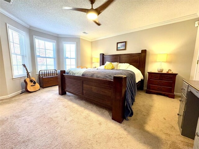 living room featuring ceiling fan, ornamental molding, and light wood-type flooring