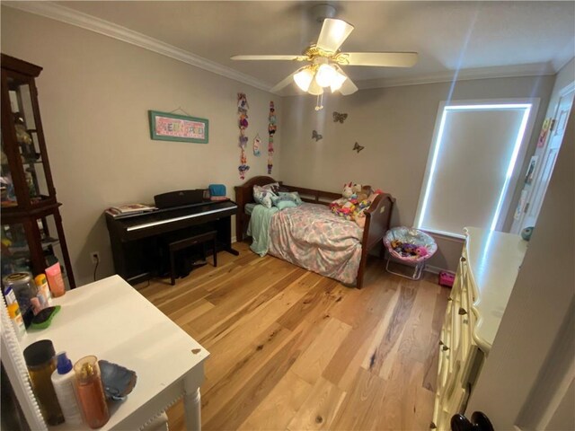 room details with hardwood / wood-style flooring and ornamental molding