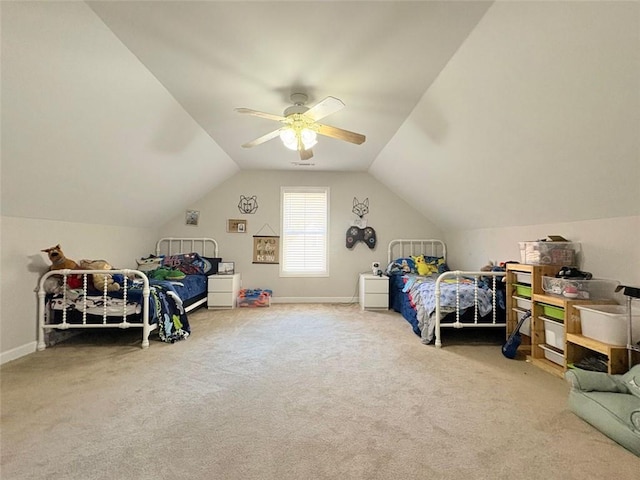 carpeted bedroom featuring lofted ceiling and ceiling fan