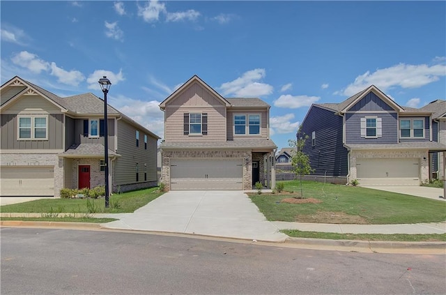 view of front of home featuring a front lawn and a garage