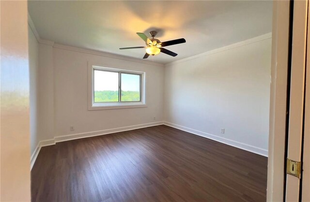 2285 Peachtree Rd NE Unit 1202, Atlanta, GA 30309 - unfurnished room with crown molding, a ceiling fan, and dark wood-type flooring