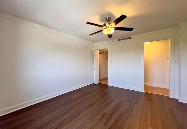 2285 Peachtree Rd NE Unit 1202, Atlanta, GA 30309 - unfurnished bedroom with dark wood finished floors, crown molding, and a ceiling fan