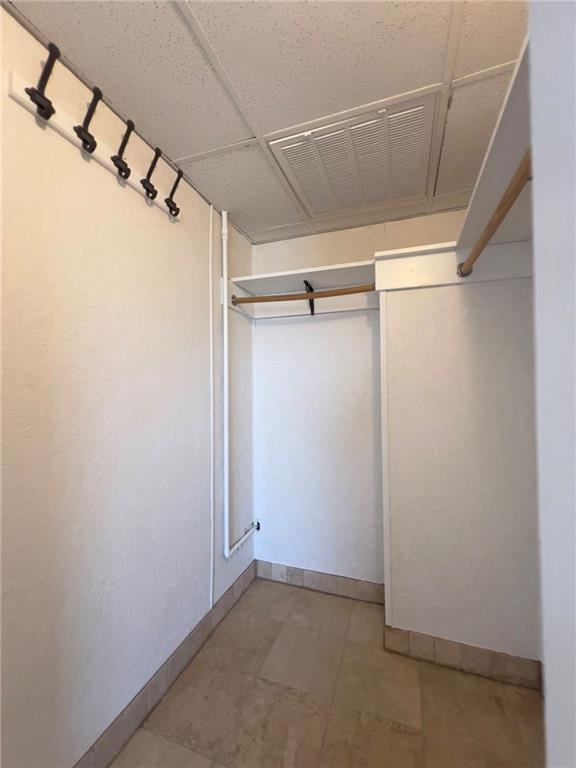2285 Peachtree Rd NE Unit 1202, Atlanta, GA 30309 - spacious closet featuring light tile patterned flooring