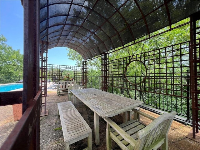 2285 Peachtree Rd NE Unit 1202, Atlanta, GA 30309 - view of patio / terrace featuring an outdoor pool and outdoor dining space