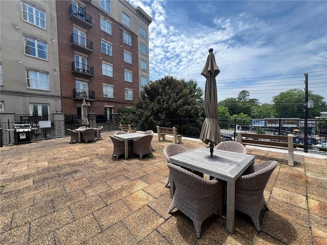 2285 Peachtree Rd NE Unit 1202, Atlanta, GA 30309 - view of patio / terrace with outdoor dining area and area for grilling