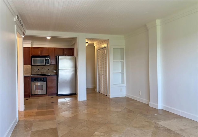 2285 Peachtree Rd NE Unit 1202, Atlanta, GA 30309 - kitchen featuring stainless steel appliances, tasteful backsplash, and crown molding