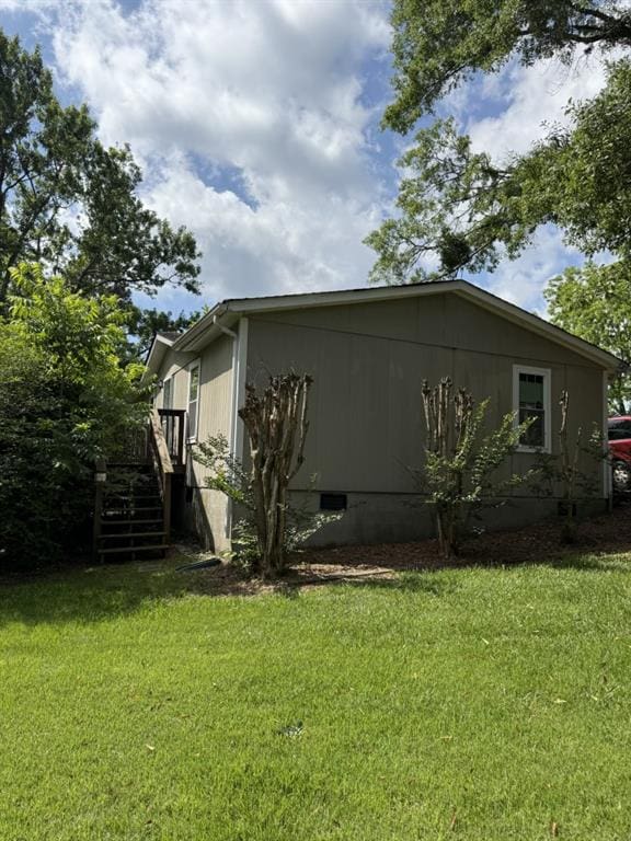 4282 By Pass, Loganville, GA 30052 - view of side of property with crawl space, a lawn, and stairs