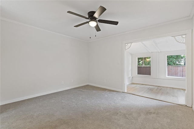 935 Bobcat Ct SE, Marietta, GA 30067 - carpeted spare room with crown molding and a ceiling fan