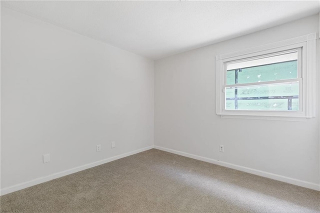 935 Bobcat Ct SE, Marietta, GA 30067 - empty room featuring carpet and baseboards