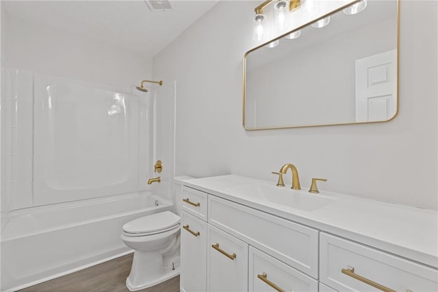 935 Bobcat Ct SE, Marietta, GA 30067 - bathroom with vanity, wood finished floors, and shower / washtub combination