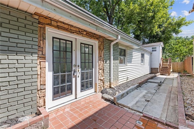 935 Bobcat Ct SE, Marietta, GA 30067 - view of exterior entry featuring french doors