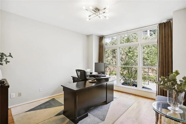 1323 Peachtree Vw NE, Atlanta, GA 30319 - office space with plenty of natural light, a chandelier, light wood-style flooring, and baseboards