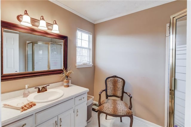 bathroom featuring ornamental molding, an enclosed shower, and vanity