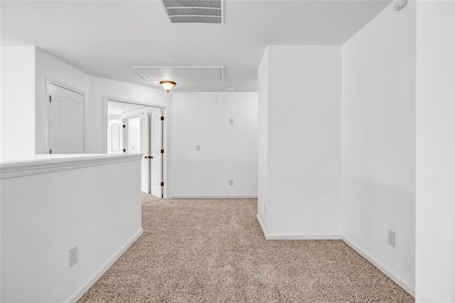 7601 Watson Cir, Locust Grove, GA 30248 - hallway featuring attic access, carpet flooring, and baseboards