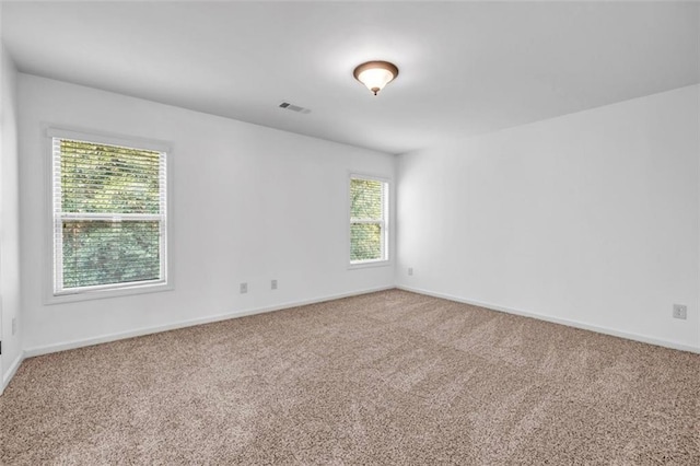 7601 Watson Cir, Locust Grove, GA 30248 - carpeted spare room featuring baseboards
