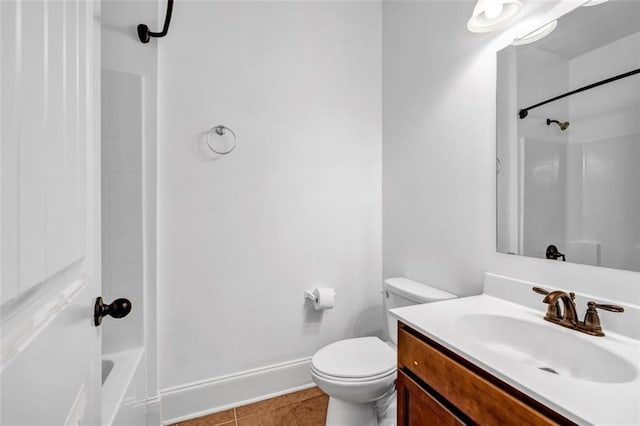 7601 Watson Cir, Locust Grove, GA 30248 - full bath featuring vanity, toilet,  shower combination, baseboards, and tile patterned floors