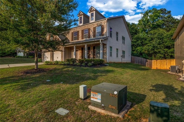 7601 Watson Cir, Locust Grove, GA 30248 - view of front of house with driveway, brick siding, and a garage