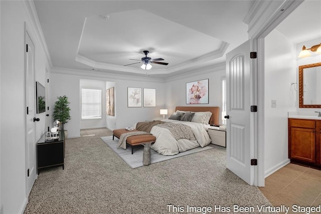 7601 Watson Cir, Locust Grove, GA 30248 - bedroom featuring a raised ceiling, baseboards, ornamental molding, and light carpet